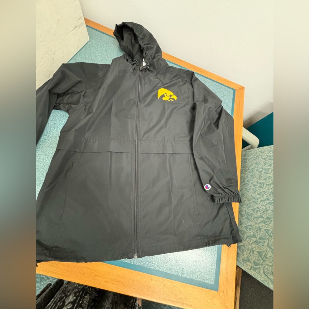 Men’s large Iowa Hawkeyes hooded wind breaker zip up jacket.
